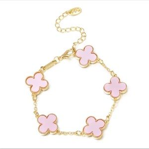 Pink four leaf clover gold tone bracelet